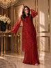Full-length front view of the red embellished net shirt and chiffon sharara set